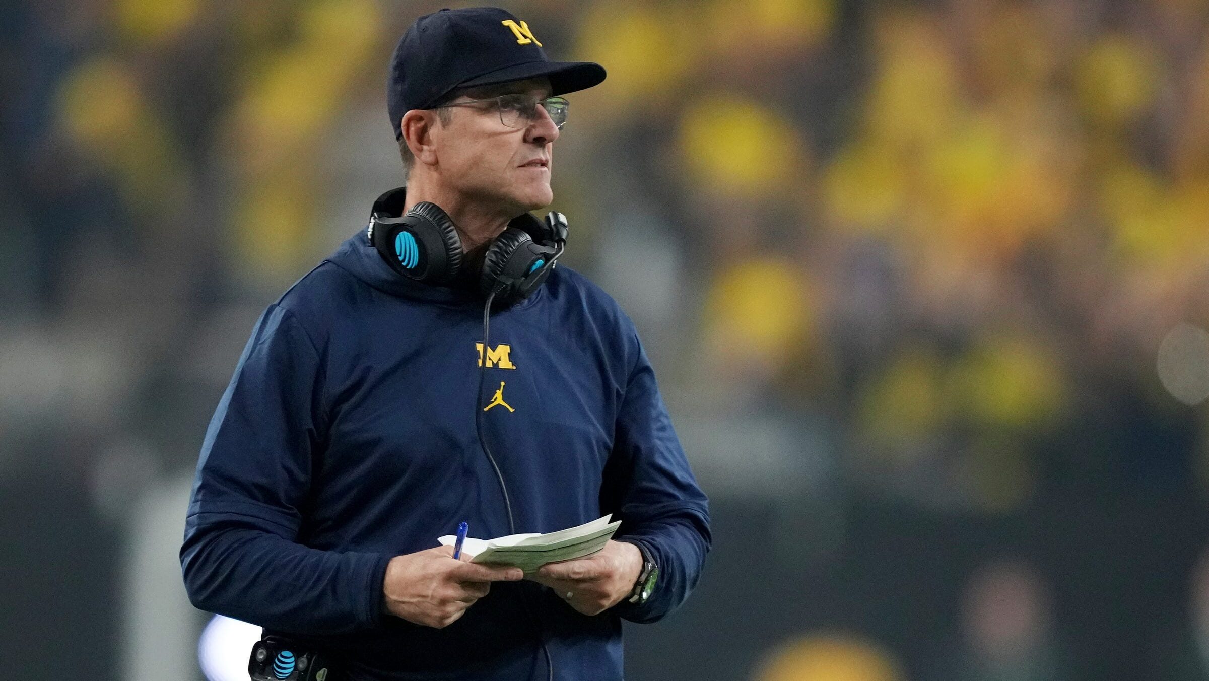 Former Michigan coach Jim Harbaugh added to lawsuit against former assistant over hacking allegations, per report
