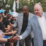 Mark Stoops and Vince Marrow shown.