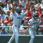 Coastal Carolina players celebrate.
