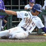 LSU's Derek Curiel slides home.