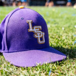 LSU hat shown on field at College World Series.