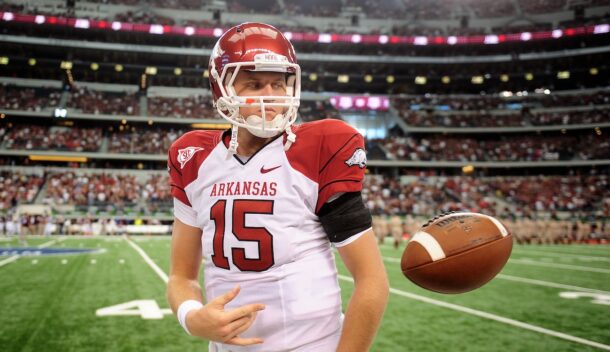 Ryan Mallett tosses a football before an Arkansas game.