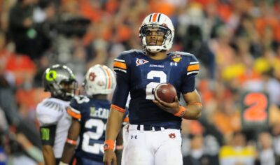 Cam Newton holds the ball during Auburn's national title victory over Oregon.