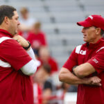 Jeff Lebby and Brent Venables on the field with Oklahoma.