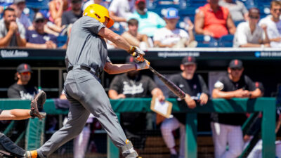 Tennessee's Jared Dickey swings the bat.