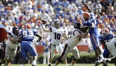 Eli Manning attempts a pass for Ole Miss against Florida.