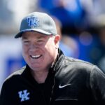 Mark Stoops is shown.
