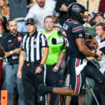 LaNorris Sellers scores a touchdown for South Carolina.