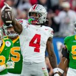 Ohio State's Jeremiah Smith celebrates a catch vs. Oregon.