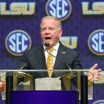 Brian Kelly speaks at SEC Media Days in 2025.