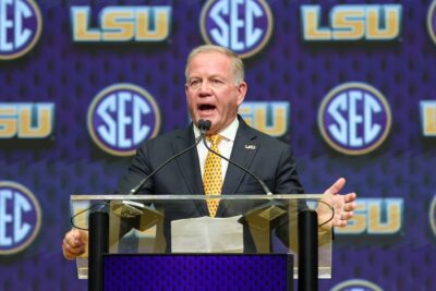 Brian Kelly speaks at SEC Media Days in 2025.