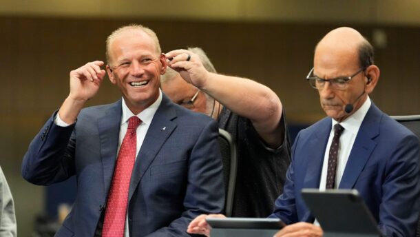 Alabama head coach Kalen DeBoer sits next to Paul Finebaum.
