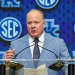 Mark Stoops speaks at SEC Media Days.