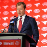 SMU head coach Rhett Lashlee at the podium.