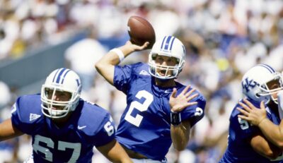 Tim Couch throws a pass for Kentucky.