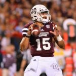 Dak Prescott attempts a pass for the Mississippi State Bulldogs.