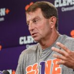 Clemson coach Dabo Swinney speaks with reporters.
