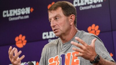 Clemson coach Dabo Swinney speaks with reporters.