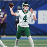 Brady Cook during a New York Jets game.
