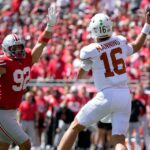 Arch Manning throws a pass against Ohio State.