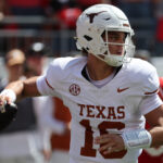 Texas quarterback Arch Manning throws a pass.