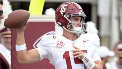 Ty Simpson warms up.
