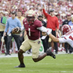 Thomas Castellanos runs for a touchdown vs. Alabama.