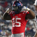 Ole Miss defensive lineman Da'Shawn Womack celebrates a play.