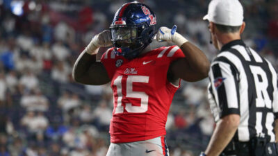 Ole Miss defensive lineman Da'Shawn Womack celebrates a play.