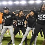 Texas A&M players celebrate.