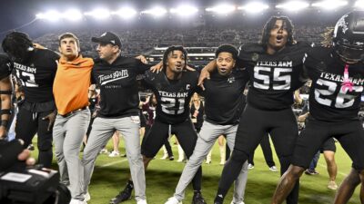 Texas A&M players celebrate.