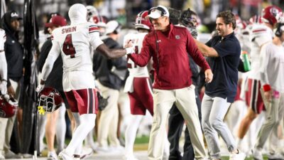 Vicari Swain celebrates with Shane Beamer.