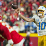 Justin Herber throws a pass vs. the Kansas City Chiefs.