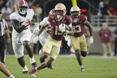 Micah Danzy runs through the Alabama defense.