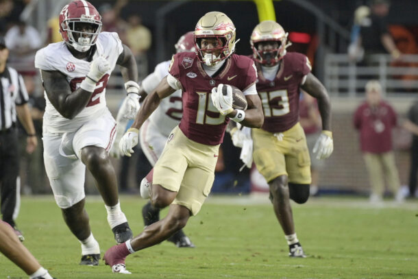 Micah Danzy runs through the Alabama defense.