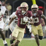 Micah Danzy runs through the Alabama defense.