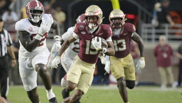 Micah Danzy runs through the Alabama defense.