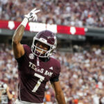 KC Concepcion celebrates for Texas A&M.