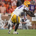 LSU tight end Trey'Dez Green reaches for a pass.