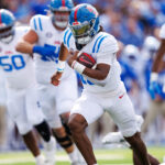 Austin Simmons runs the ball vs. Kentucky.