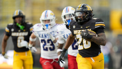 Mizzou running back Jamal Roberts carries the ball.