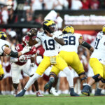 Michigan quarterback Bryce Underwood throws a pass.