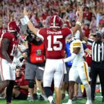Alabama QB Ty Simpson celebrates a touchdown.