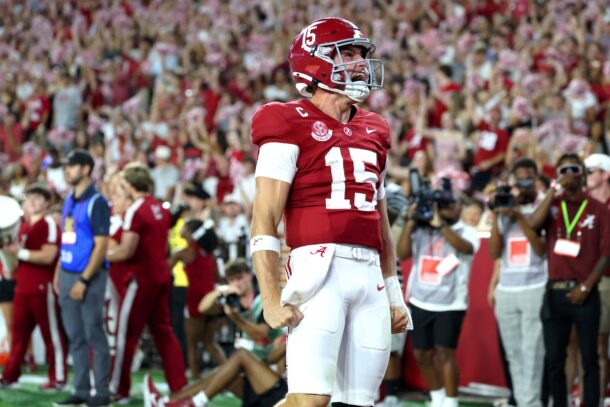 Ty Simpson celebrates an Alabama touchdown.