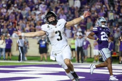 Army football player celebrates.