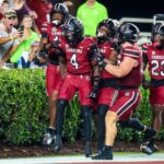 Vicari Swain celebrates a punt-return TD.