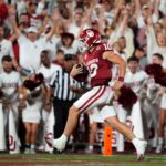 Oklahoma quarterback John Mateer scores a touchdown.