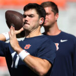 Jackson Arnold warms up before a game.