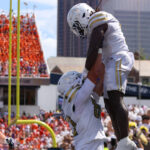 Georgia Tech players celebrate vs. Clemson.