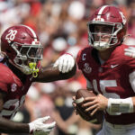 Ty Simpson looks to make a play.